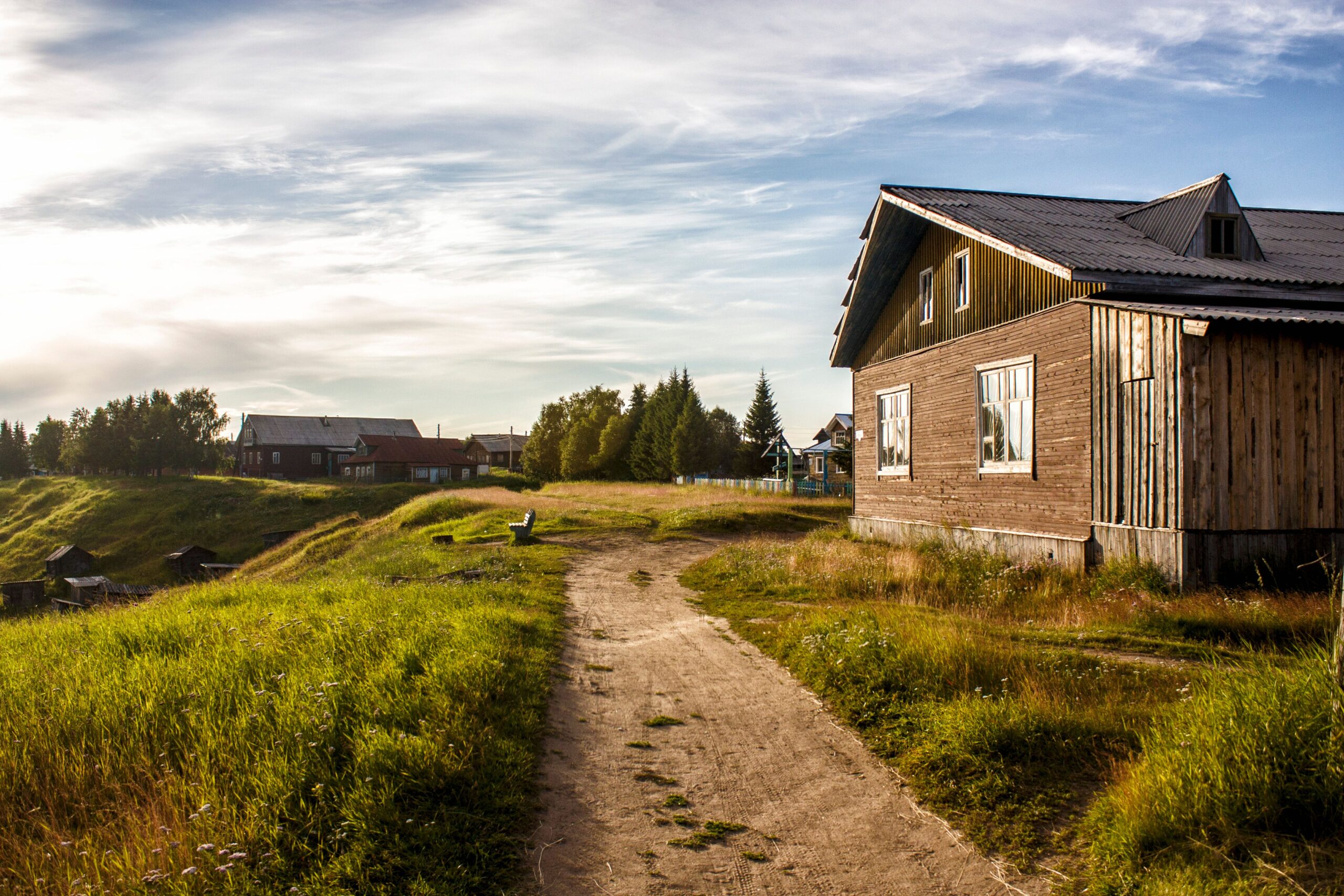 Scenic view of Soya village in Russia with rustic houses and unpaved roads.